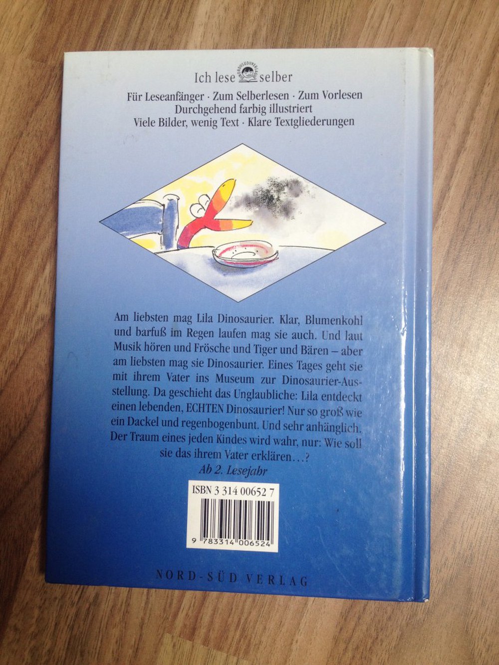 Lila und der regenbogenbunte Dinosaurier