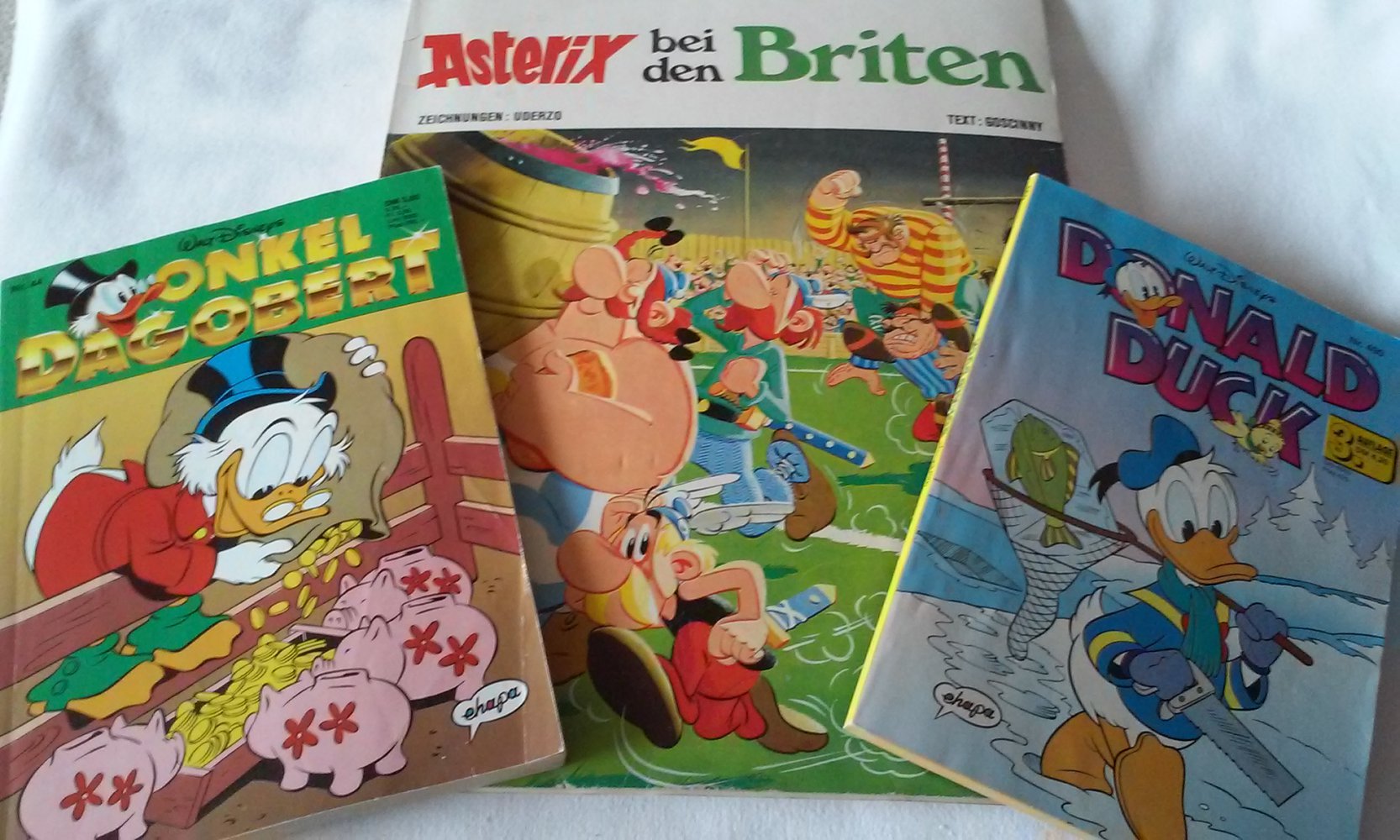 3 Comic´s Asterix bei den Briten, Onkel Dagobert und Donald Duck 