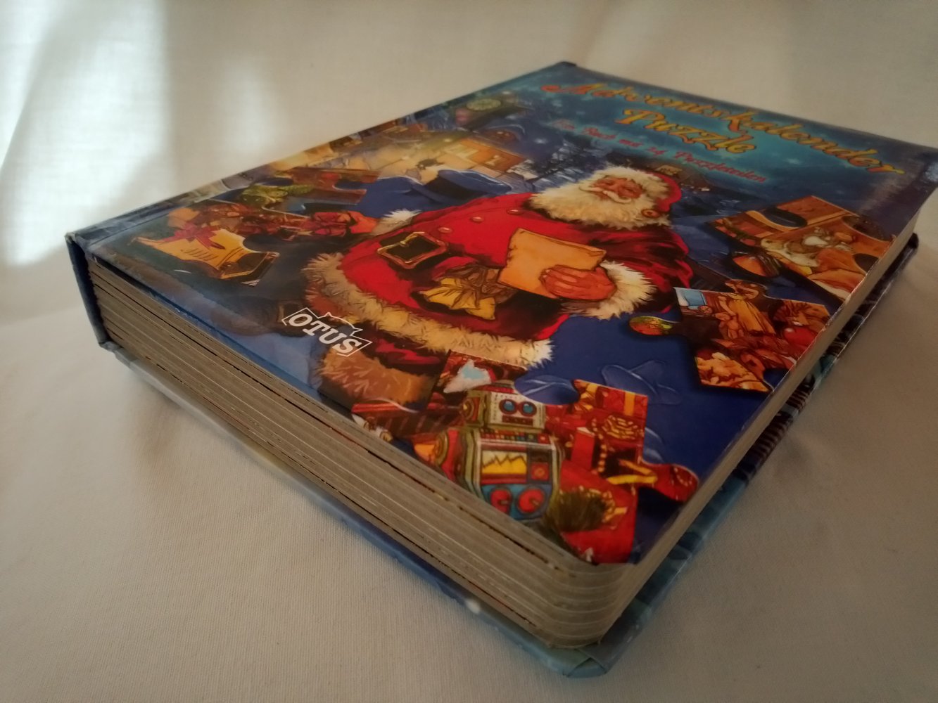 Adventskalender-Puzzle: Ein Buch mit 24 Puzzleteilen