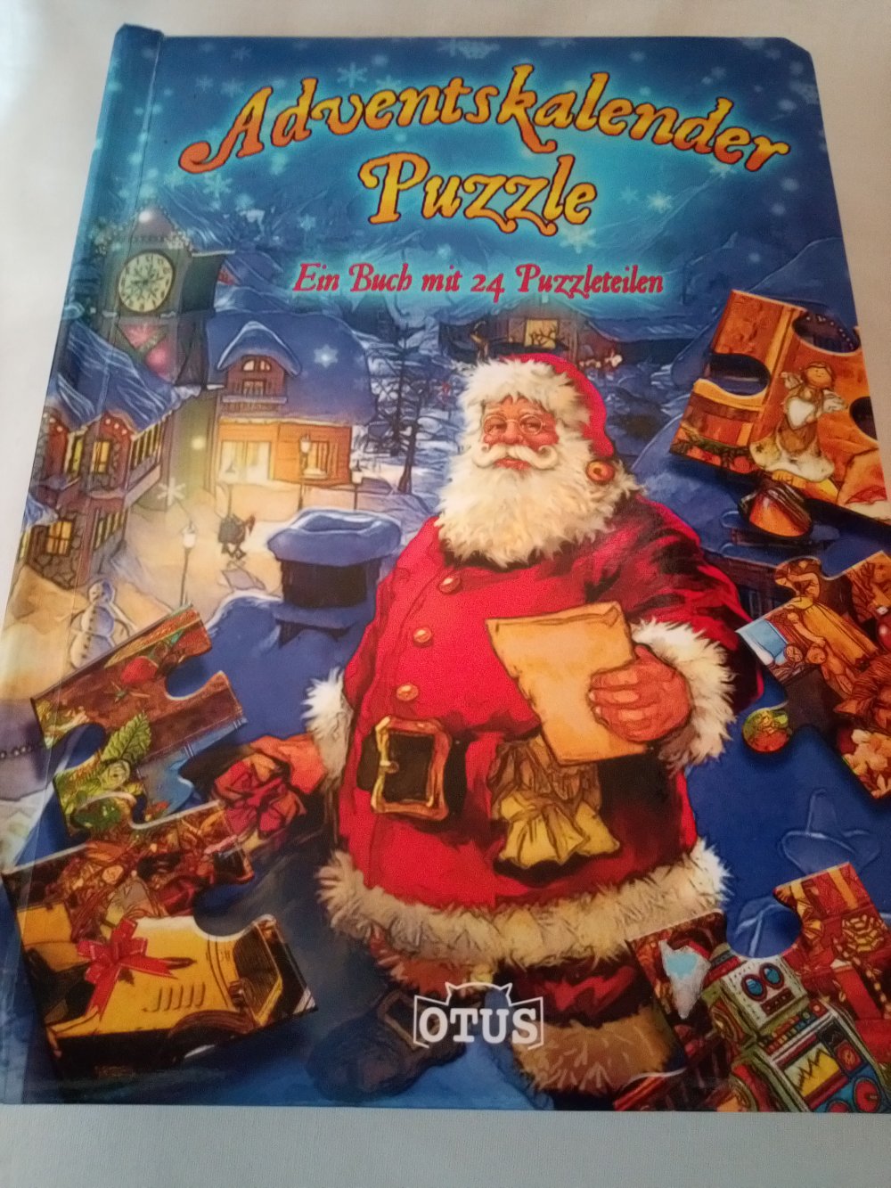 Adventskalender-Puzzle: Ein Buch mit 24 Puzzleteilen