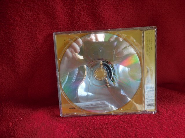 This Time includes Bonus Track I Wonder Why