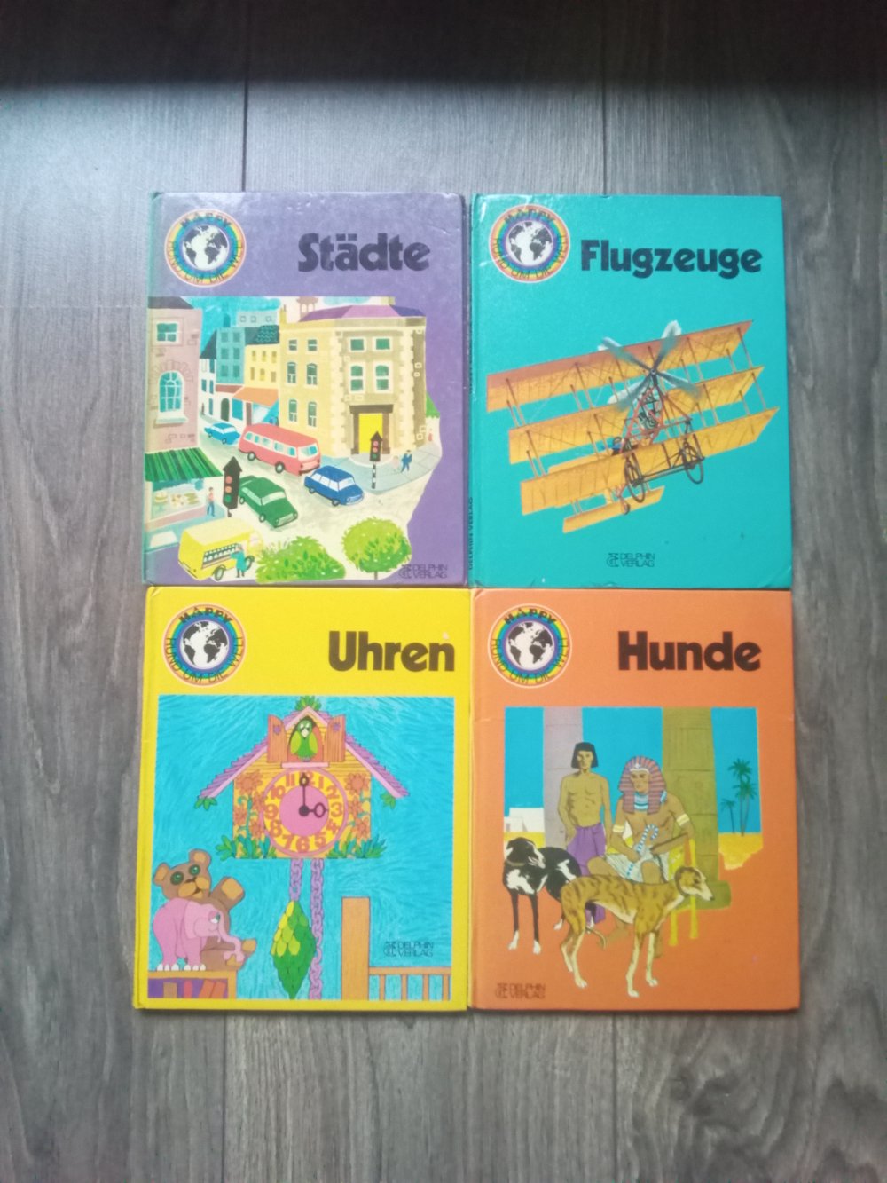 4x Happy rund um die Welt Uhren Hunde Städte Flugzeuge Sachbuch