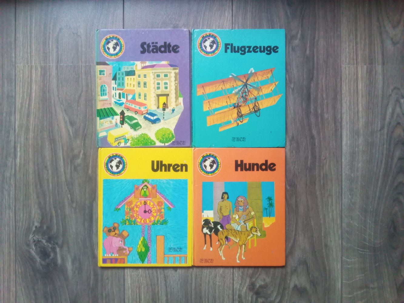 4x Happy rund um die Welt Uhren Hunde Städte Flugzeuge Sachbuch