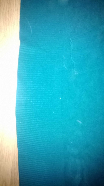 Türkiser Strickpulli