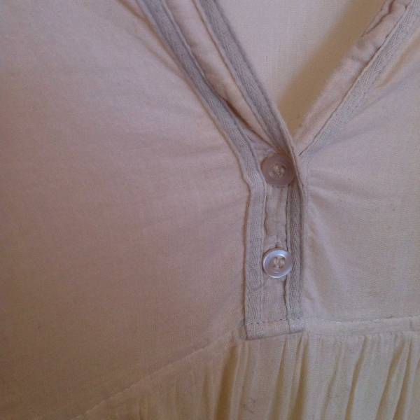 Hellgelbe Bluse Tunika Knopfleiste