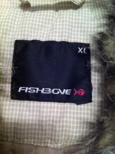 Helle Winterjacke mit Fellkragen 