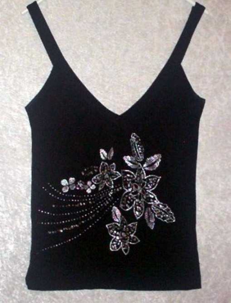 Schwarzes Top mit Pailetten