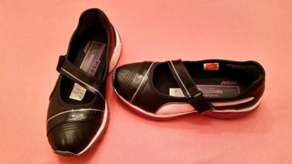 Schwarze Schuhe von Puma