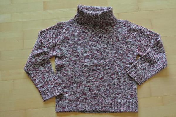 Schöner Strickpullover mit Rollkragen