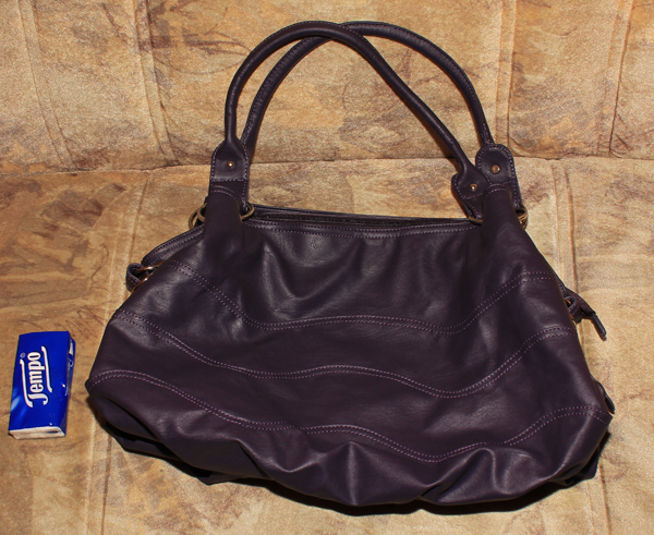 Schicke lila Handtasche