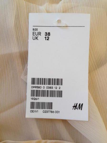 Schönes Abendkleid in nude mit silbernen Pailletten