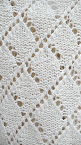 Off-White gemusterte Strickjacke H+M Größe M