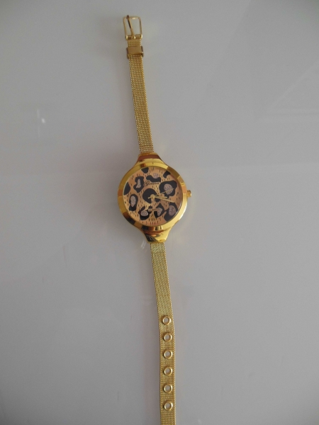 uhr gold leo animal print geneva