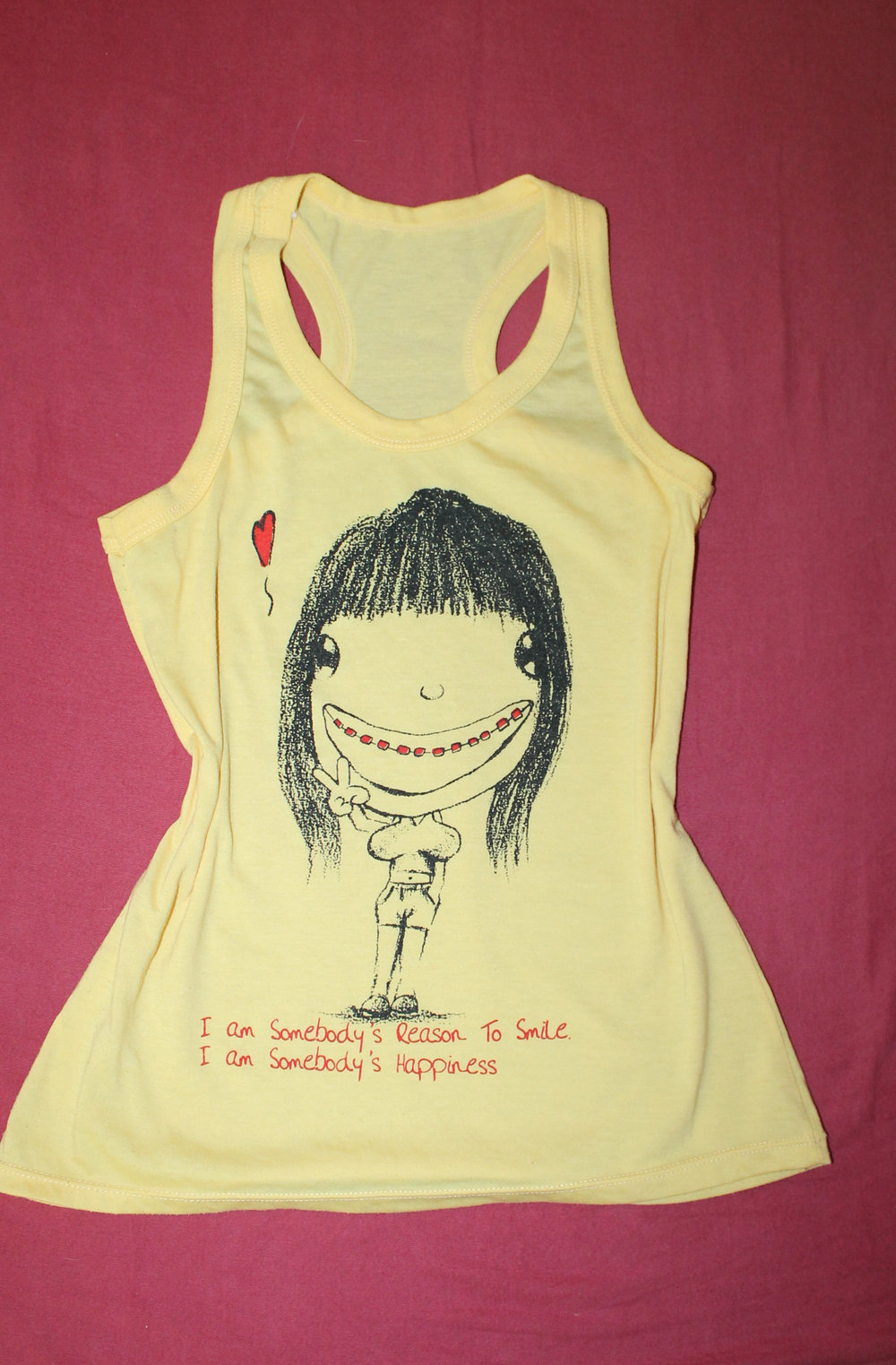 gelbes Muskelshirt mit Aufdruck und Spruch