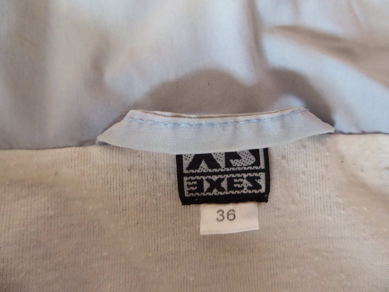 XS.EXES hellblaue Übergangsjacke