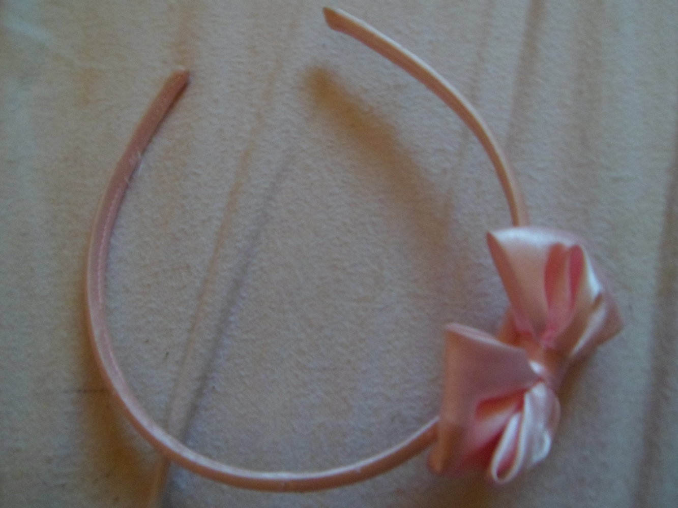 Rosa Haarreif mit Schleife