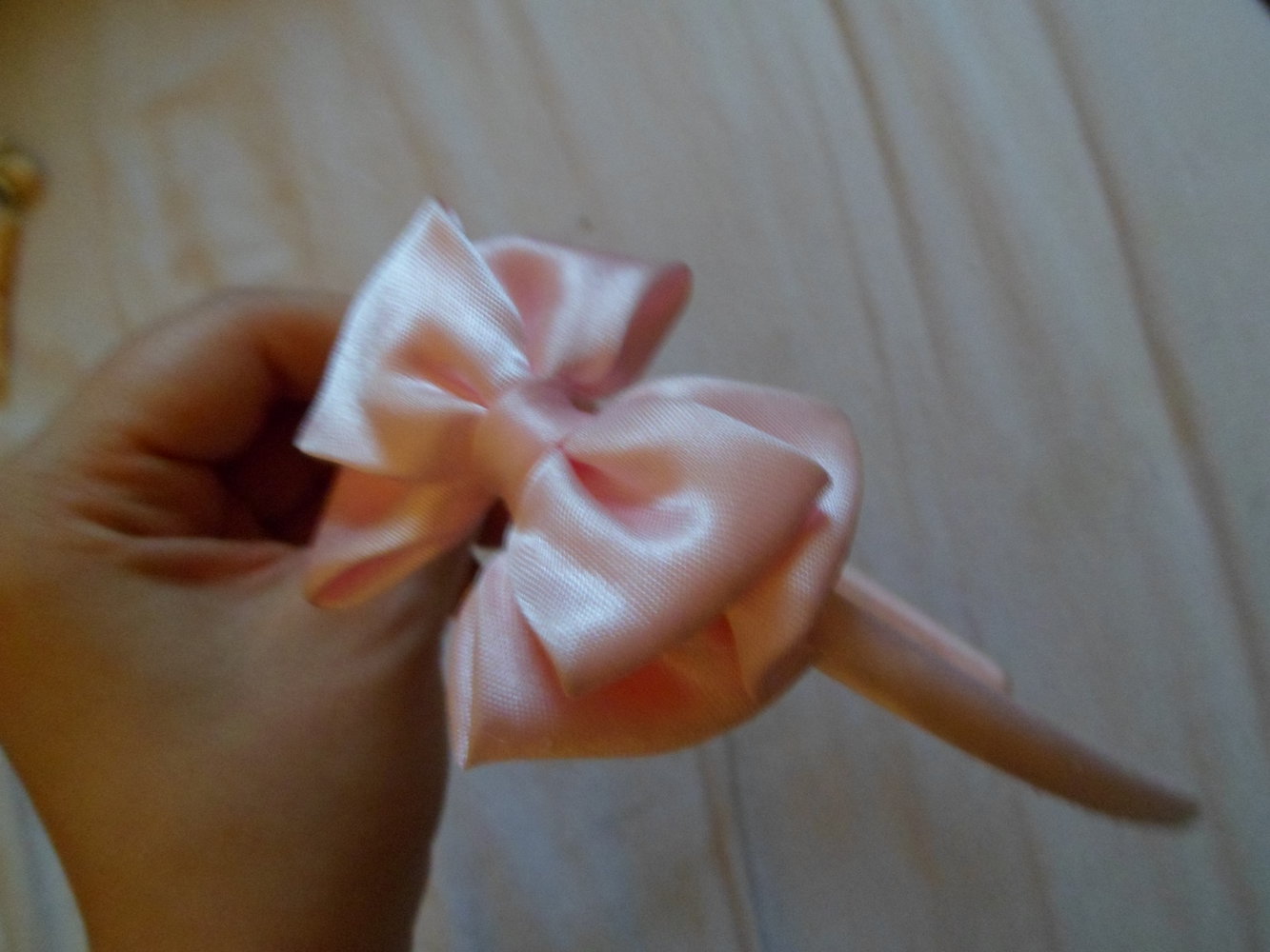 Rosa Haarreif mit Schleife