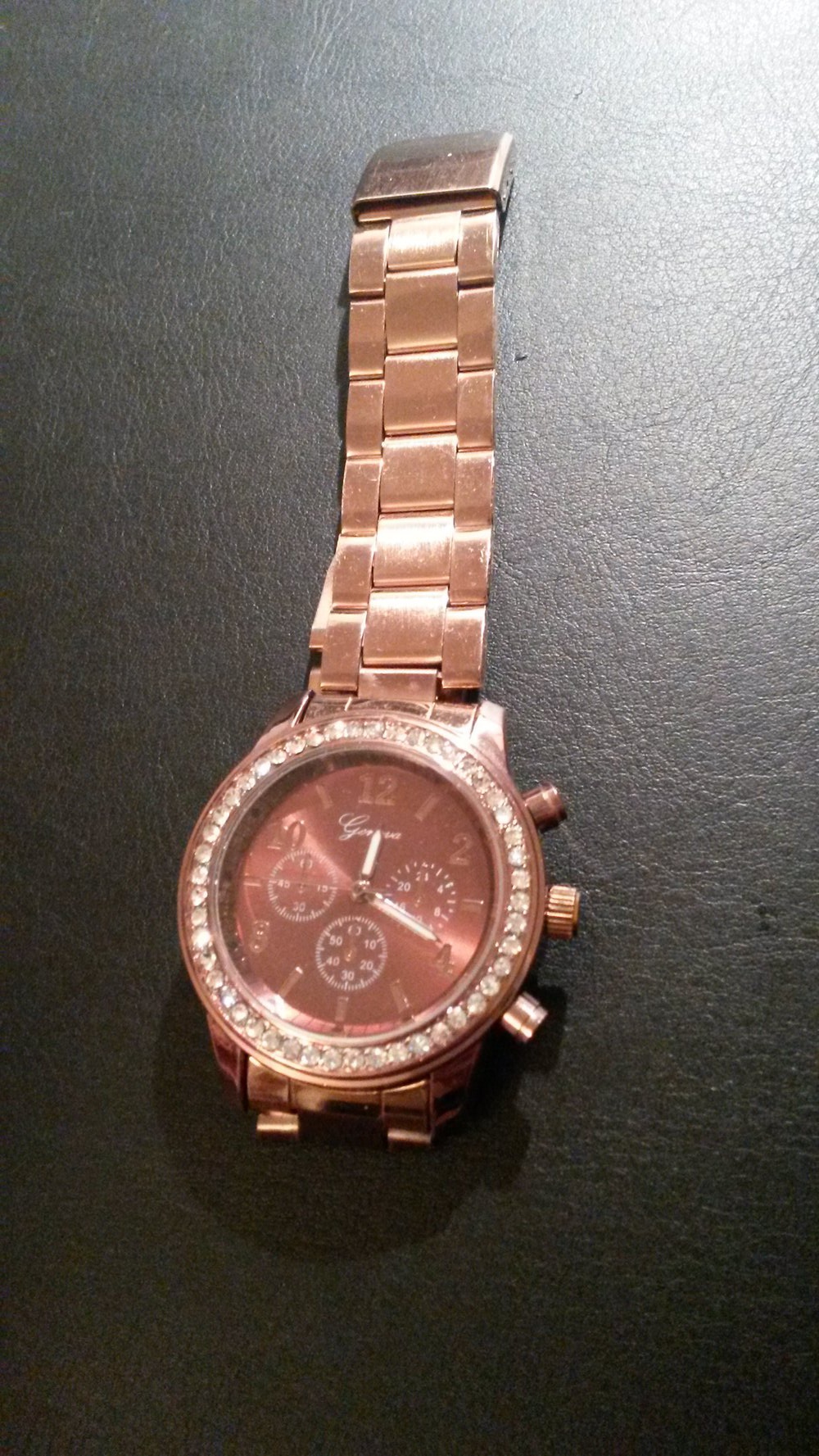 Schöne Uhr in rose/rostbraun