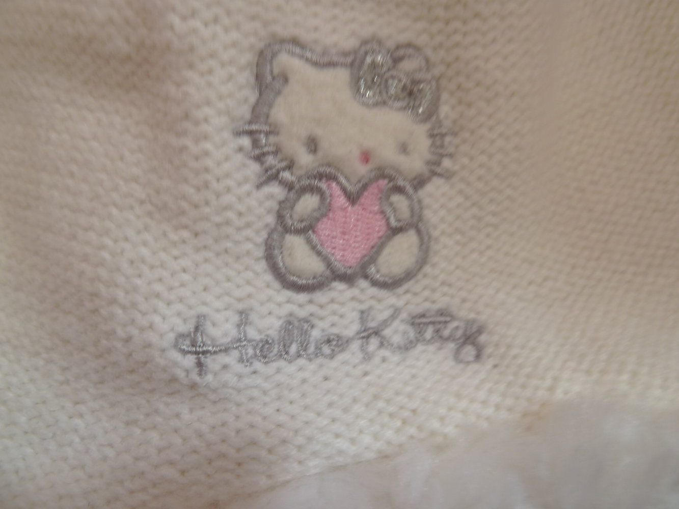 C&A Sanrio Mütze Hello Kitty 12-24 Monate Pudelmütze Webpelz innen Fleece Weiss