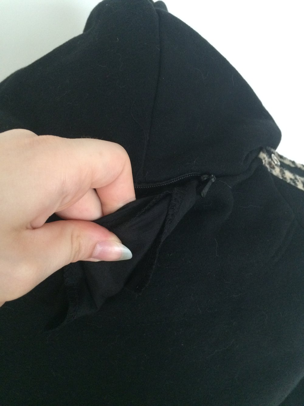 süßer Zipper mit Katzenohren und Fell leo