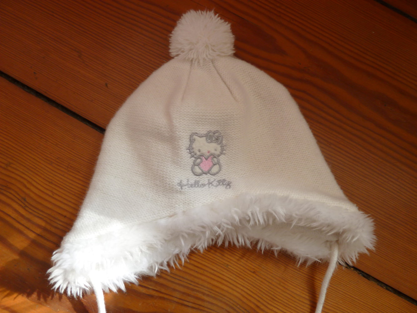 C&A Sanrio Mütze Hello Kitty 12-24 Monate Pudelmütze Webpelz innen Fleece Weiss