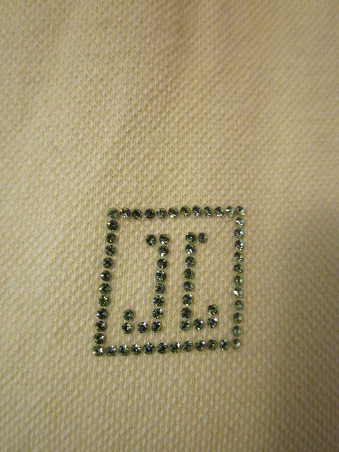 Lindgrünes Polo-Shirt mit Straßbesatz