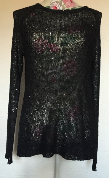Schwarzer Pullover mit Pailletten 