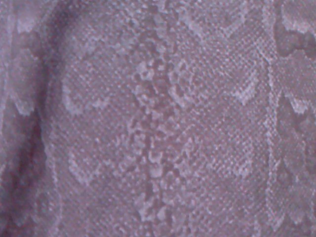 Hose Schlangenprint Stiefelhose sehr stretchig Gr.52