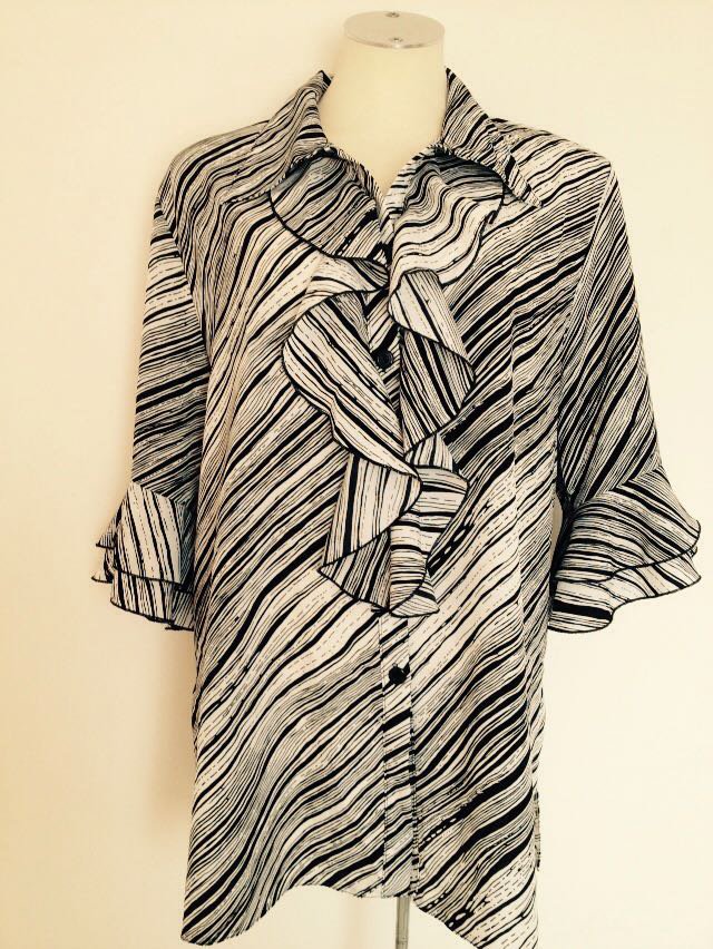 Exclusive schwarz/weiße Bluse 