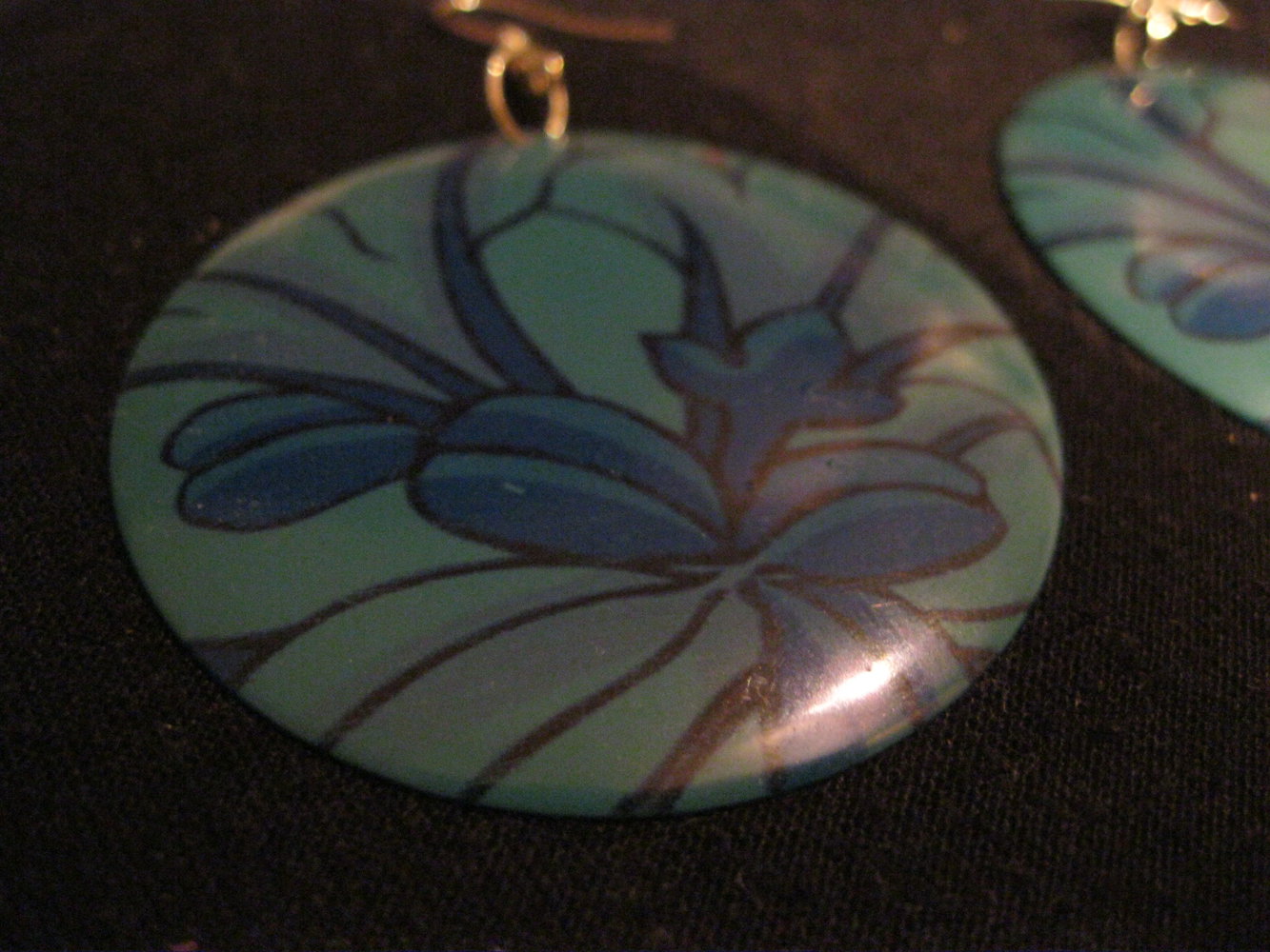 petrolfarbene Ohrringe mit Blumenmuster