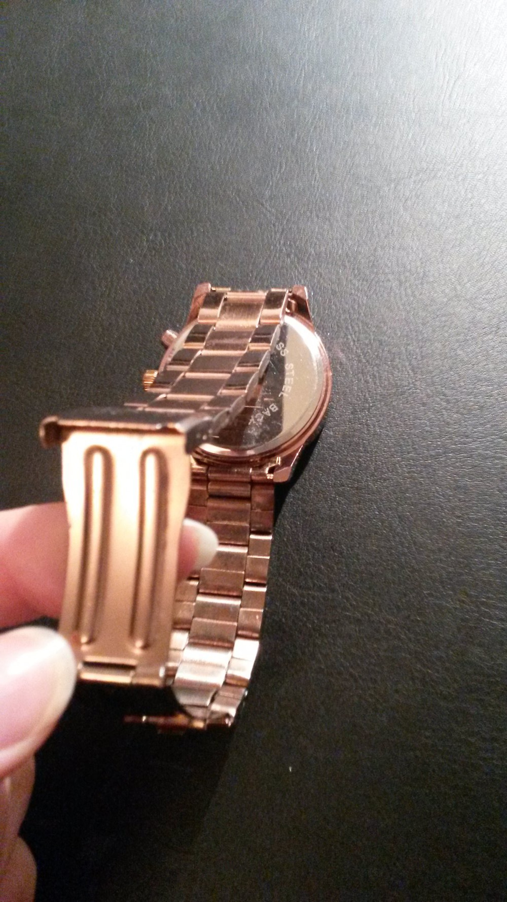 Schöne Uhr in rose/rostbraun