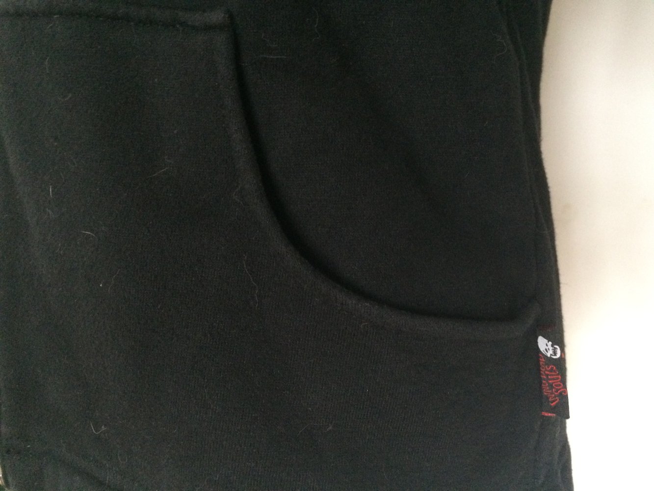 süßer Zipper mit Katzenohren und Fell leo