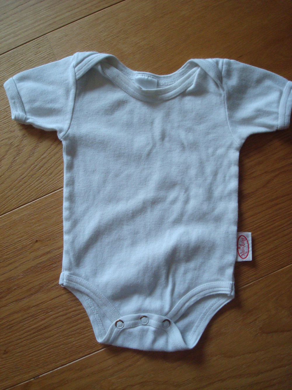 2 Bodys Kurzarm in Weiß Unisex Gr. 62
