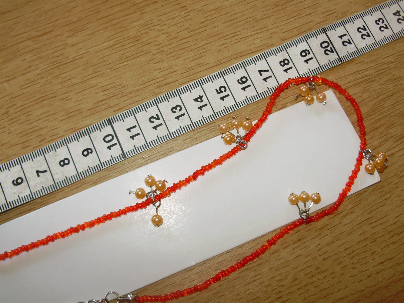 Kette Collier filigran orangefarbene Nonparailles Perlen NEU orig verp.