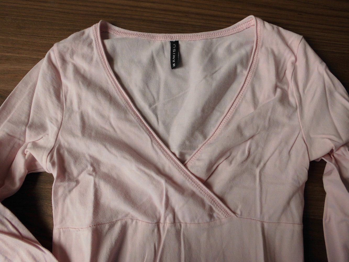 Rosa Langarmshirt in Wickeloptik Gr. 36