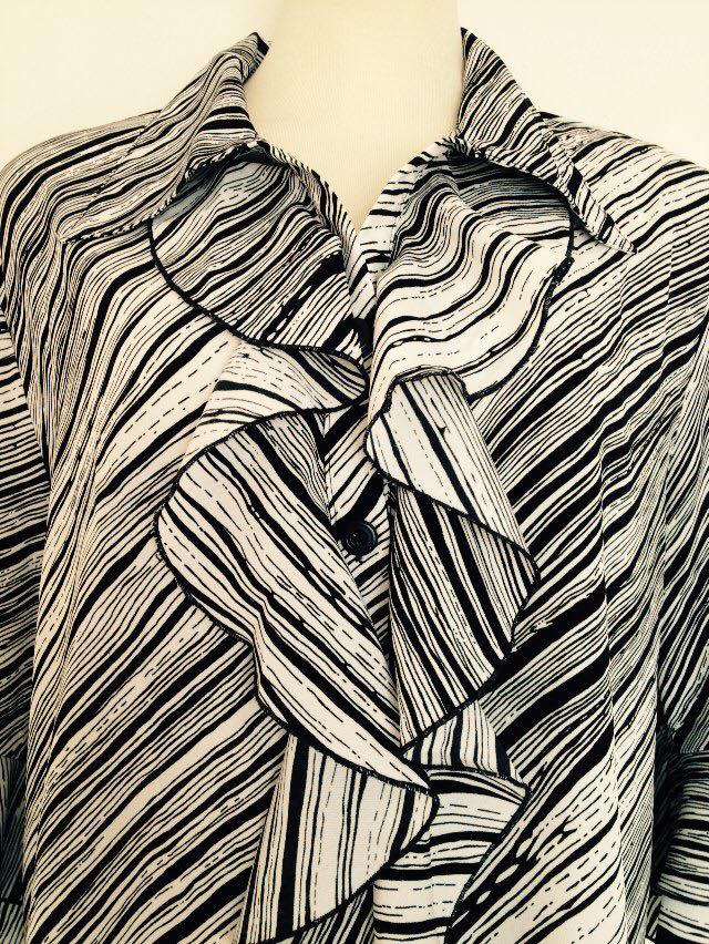 Exclusive schwarz/weiße Bluse 