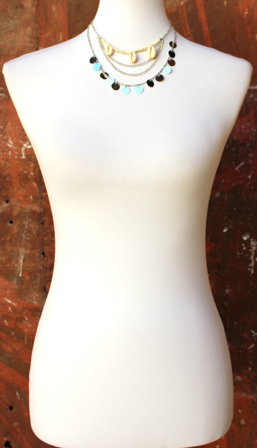 mehrreihige filigrane Statementkette in silber u. mit Muscheln