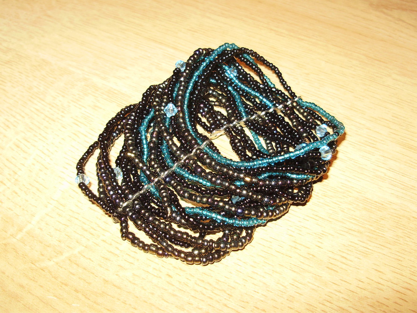 Mehrreihiges Perlenarmband ganz kleine Perlen shwarz/türkis/bronze