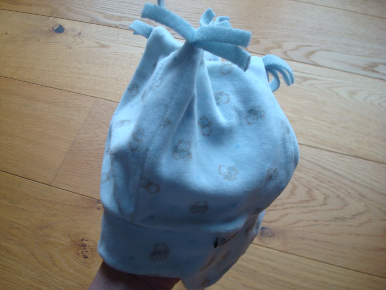 warme Mütze mit Ohrenklappen und Zipfel von Sterntaler