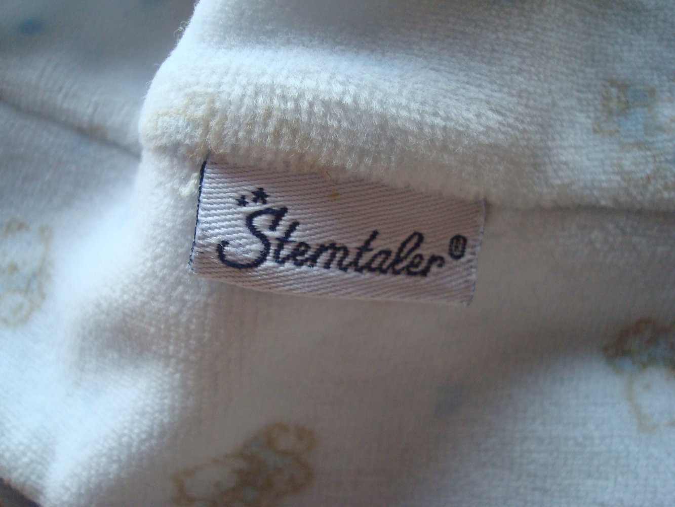 warme Mütze mit Ohrenklappen und Zipfel von Sterntaler