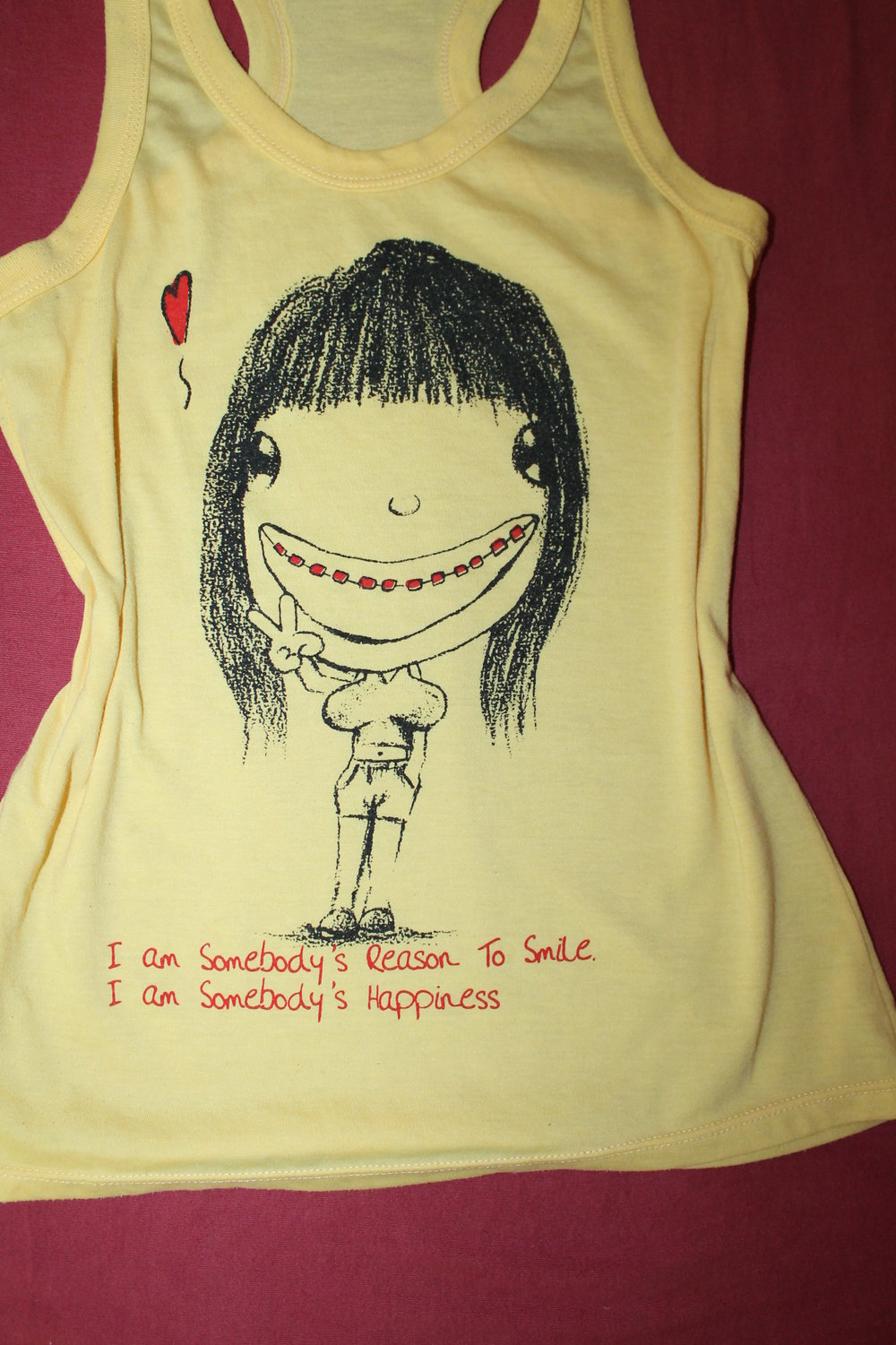 gelbes Muskelshirt mit Aufdruck und Spruch