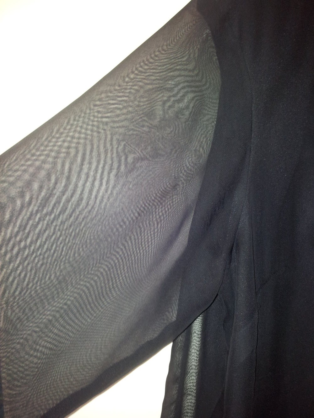 Bluse schwarz transparente Ärmel & Oberstoff Gr. 50