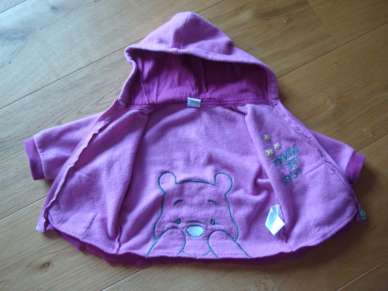 süße Jacke mit Winnie Pooh Gr. 62/68