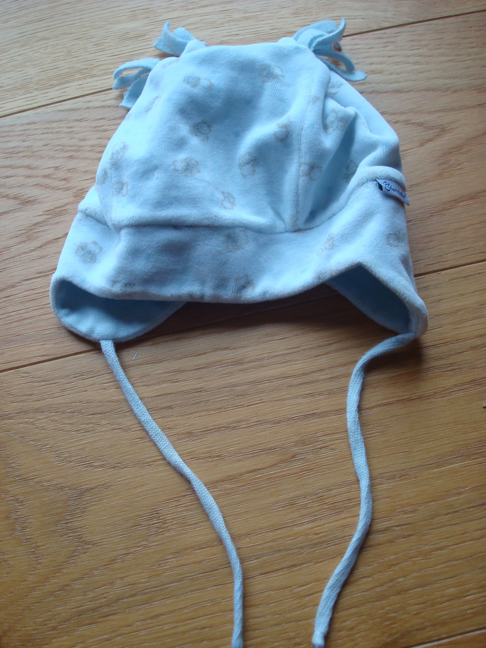 warme Mütze mit Ohrenklappen und Zipfel von Sterntaler