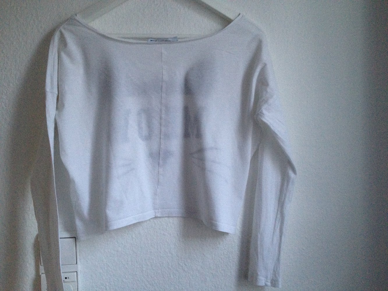 Locker sitzendes Oberteil