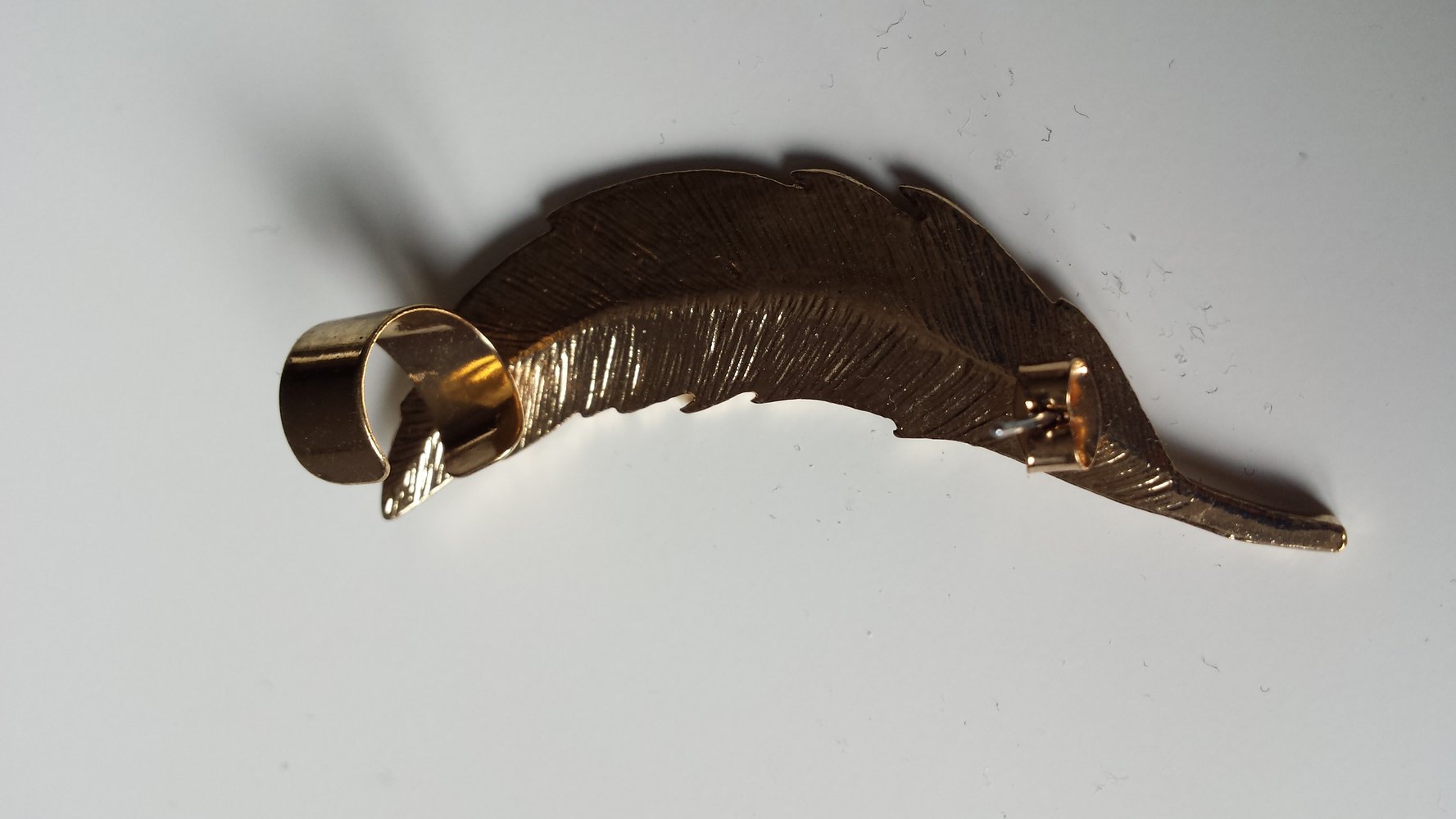 goldfarbene Ohrklemme Ohrring Feder Sommer Boho