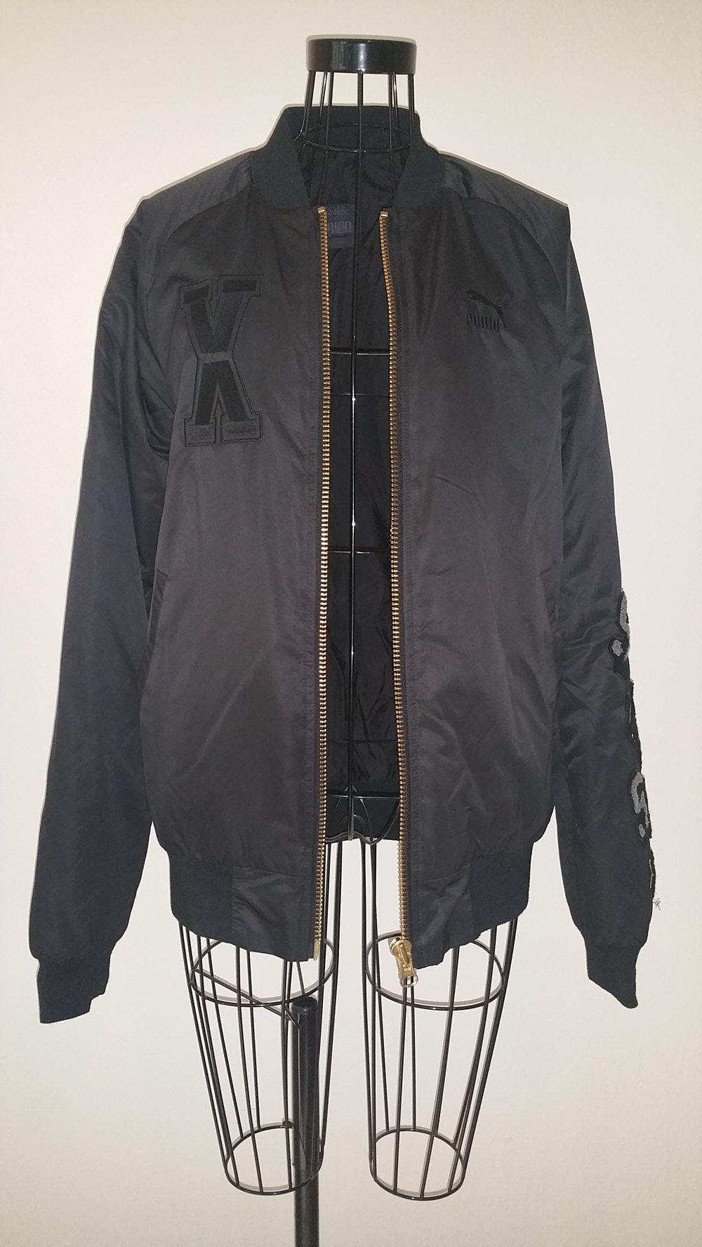 Puma Vashtie Bomberjacke, schwarz/gold