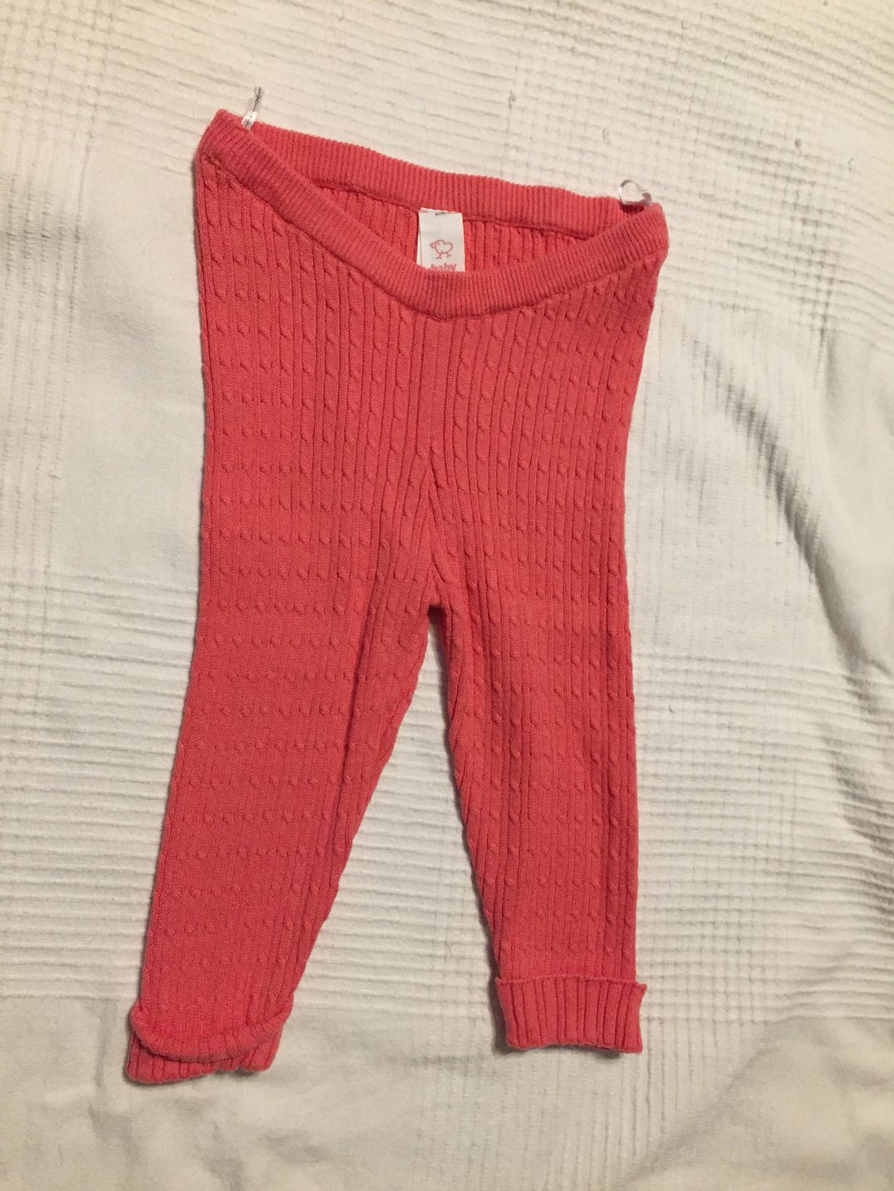 Korallfarbene Leggings mit Muster