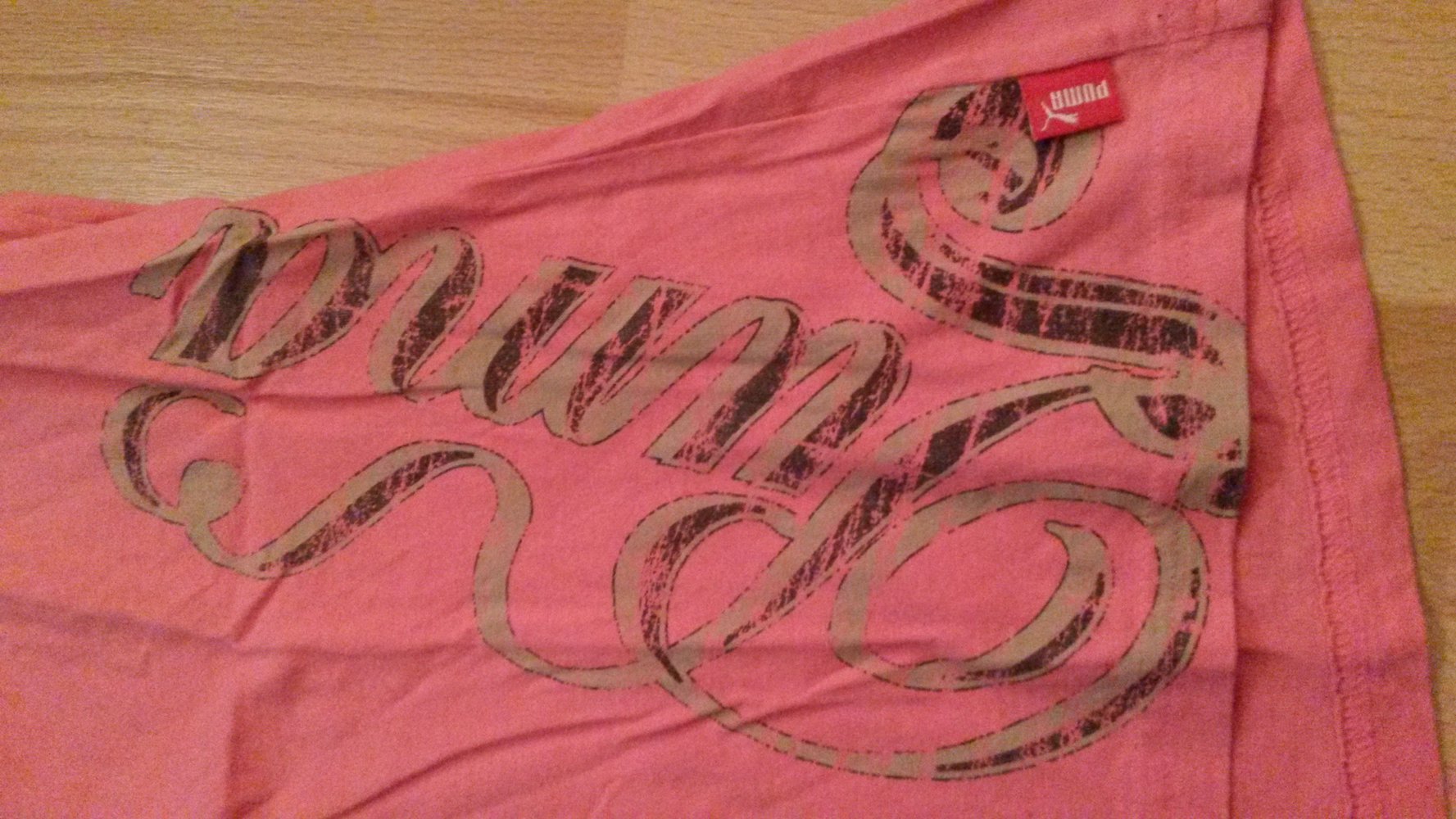 Rosa Puma T-Shirt mit Flügel Rückenaufdruck