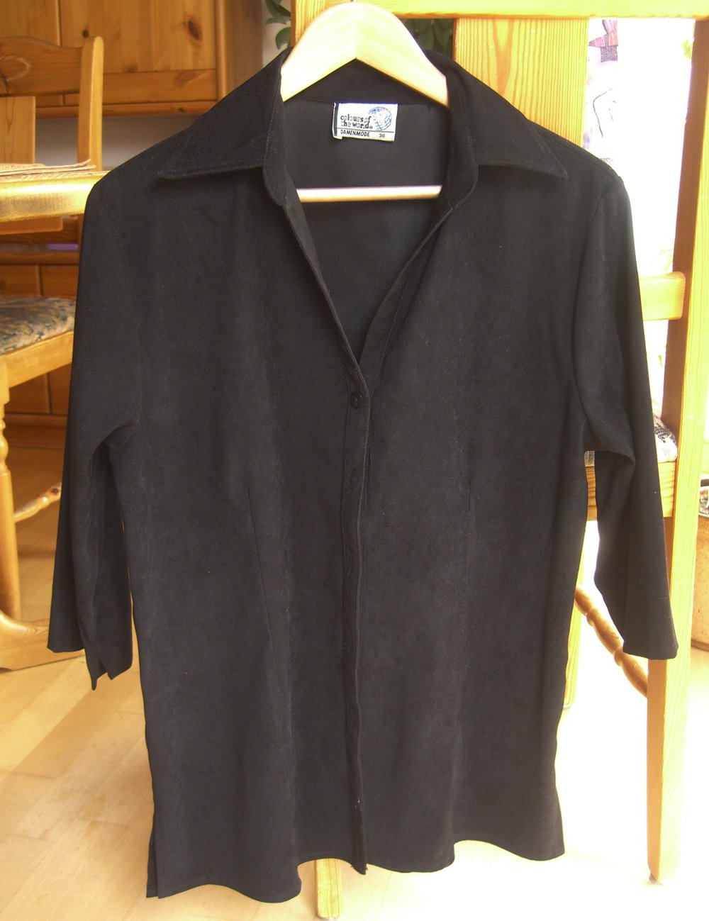 Elegante schwarze Bluse